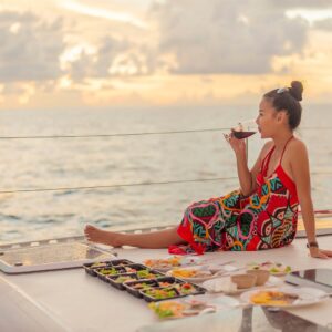 Guest enjoying dinner while watching the sunset in Phuket
