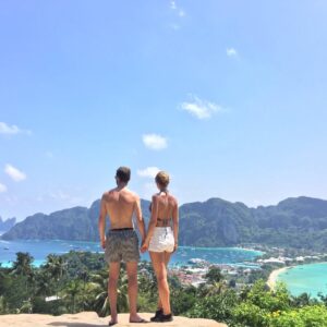 Guests relaxing on the beach at Phi Phi Islands